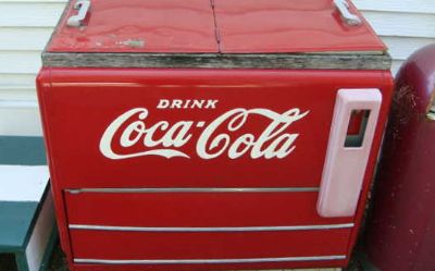 Photo of a 1957 Coca-Cola Coke Clock, Coke Coolers for sale