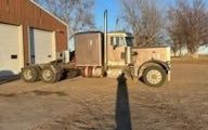 Photo of a 1984 Peterbilt 359 EXD Hood Sleeper Tractor for sale