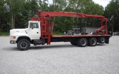 Photo of a 1992 Ford L9000 With Mounted On 1992 IMT 13034 Knuckle Boom Crane for sale